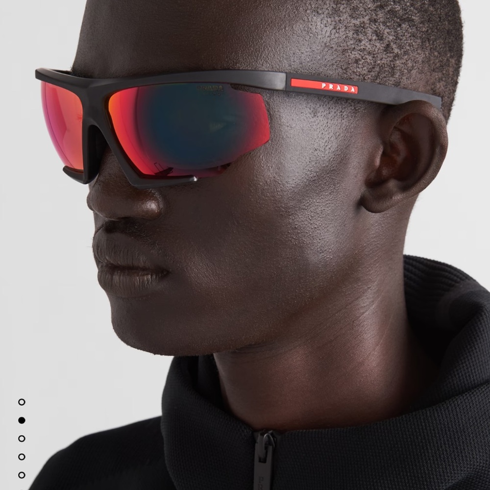 Prada Línea Rosa sports sunglasses with red mirrored lenses